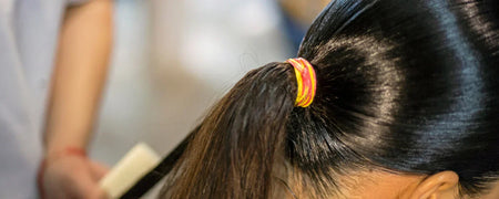 Sleek buns og sleek ponytails: En frisure til enhver anledning